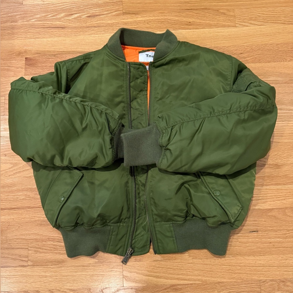 TNA green bomber